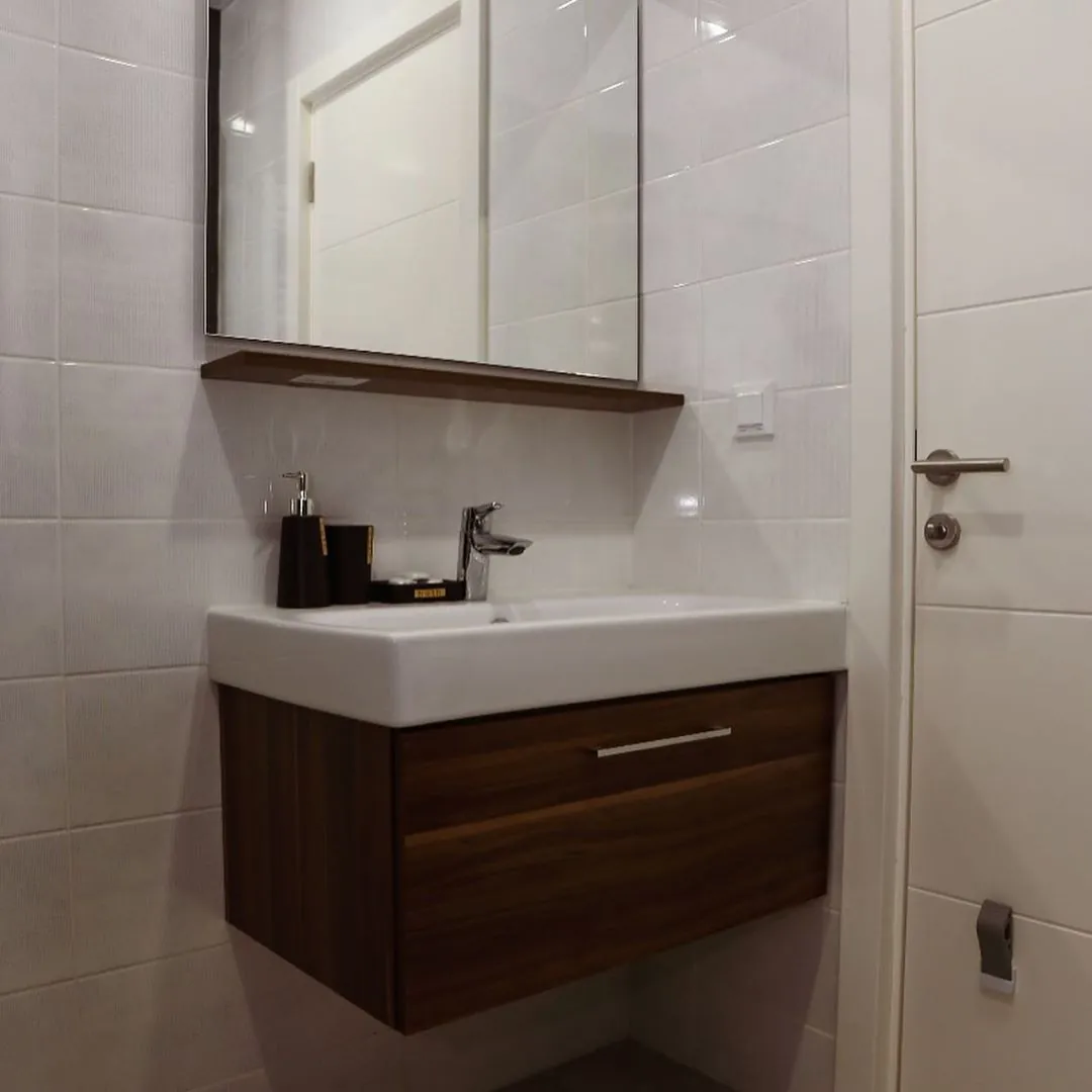 Bathroom sink, mirror and storage cabinet