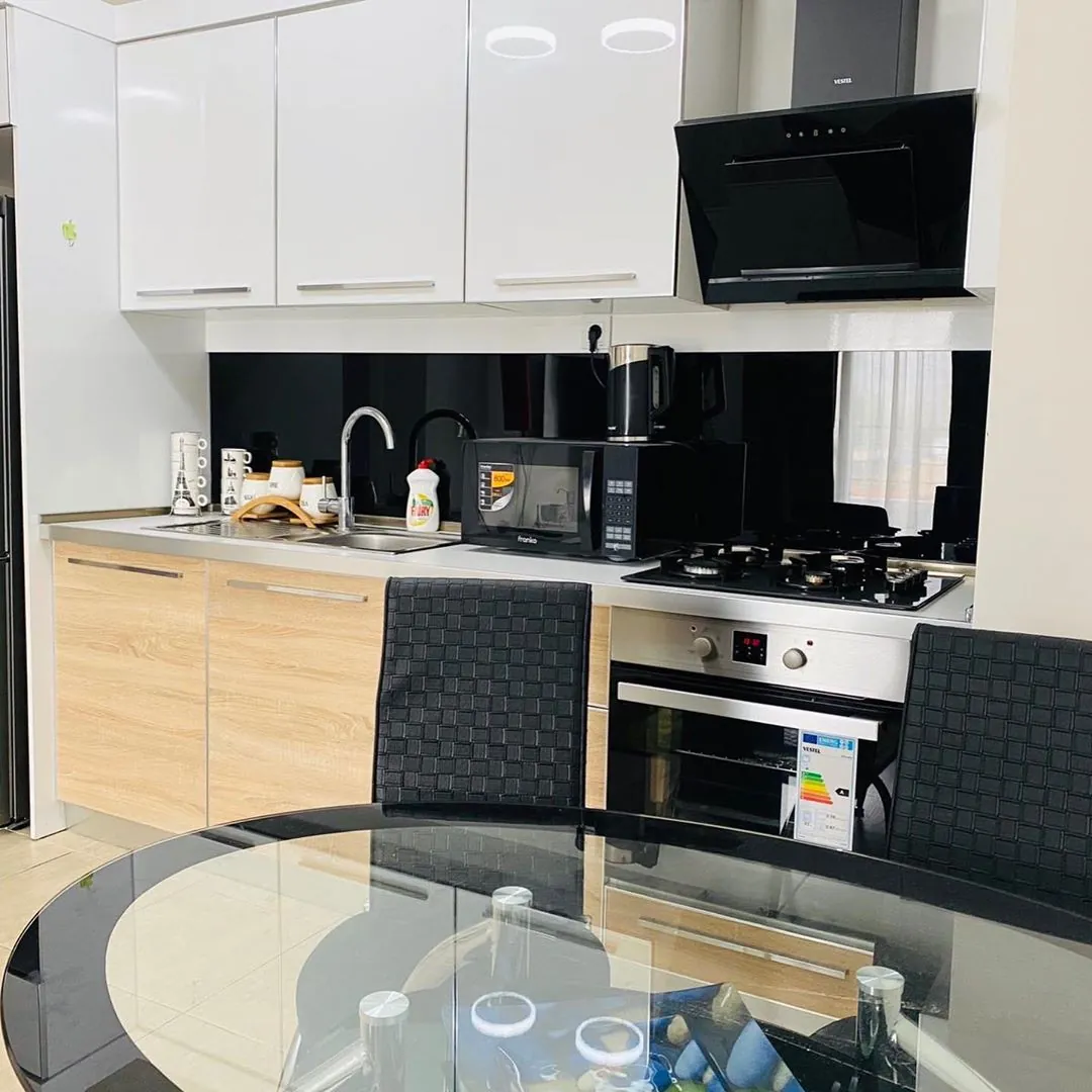 Dining table beside the apartment kitchen