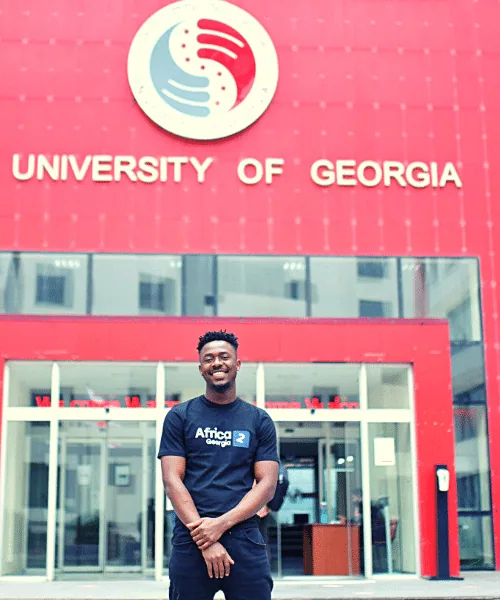 A student outside the University of Georgia building